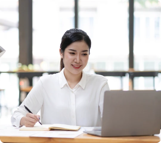 woman-sitting--using-laptop-happy-young-businesswoman woman-sitting--using-laptop-happy-young-businesswoman