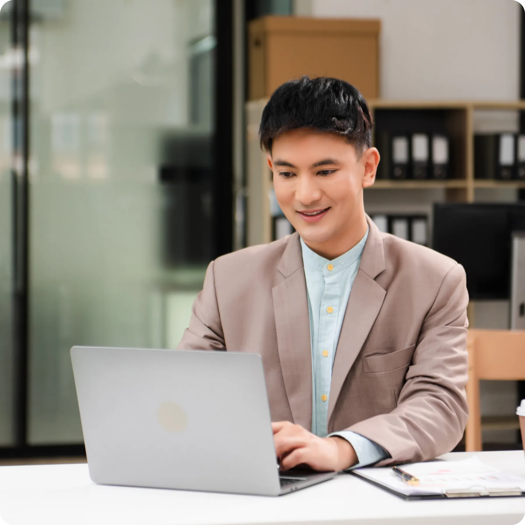 young-business-man-working-office copy young-business-man-working-office copy